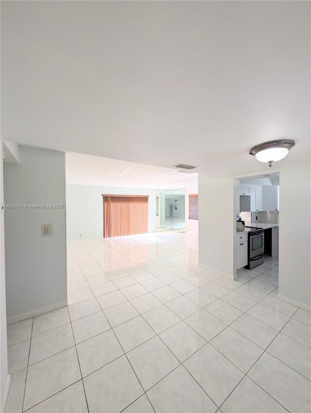 14901 SW 4th St Unit 9A, Pembroke Pines, FL 33027 - unfurnished room with light tile patterned floors