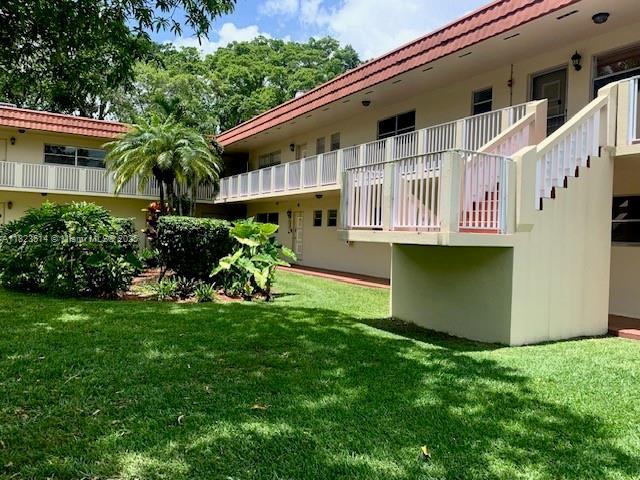 14901 SW 4th St Unit 9A, Pembroke Pines, FL 33027 - view of green lawn