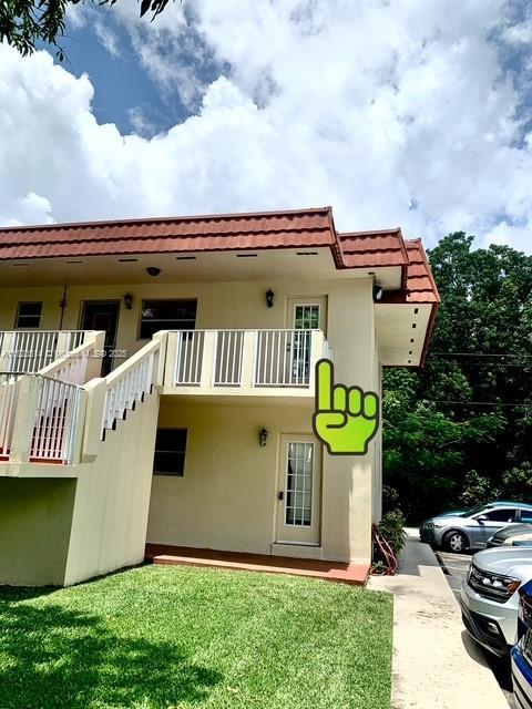 14901 SW 4th St Unit 9A, Pembroke Pines, FL 33027 - view of property with uncovered parking