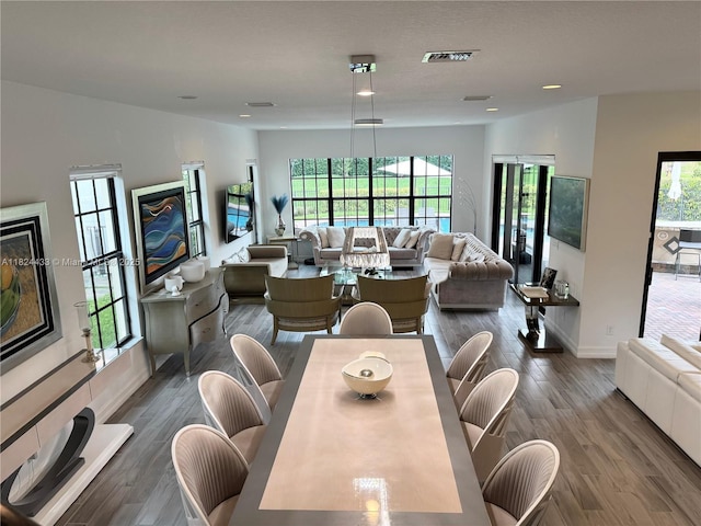 11455 Solstice Cir, Parkland, FL 33076 - dining area with wood finished floors and recessed lighting
