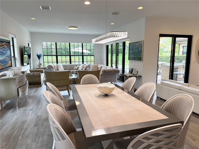 11455 Solstice Cir, Parkland, FL 33076 - dining room featuring light wood-type flooring and recessed lighting