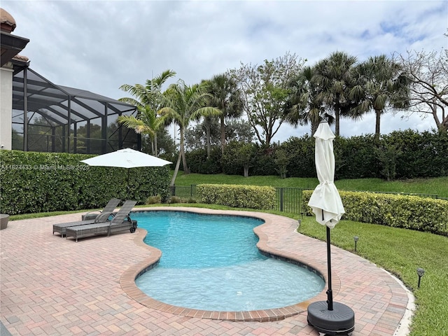 11455 Solstice Cir, Parkland, FL 33076 - view of swimming pool featuring a patio area and glass enclosure