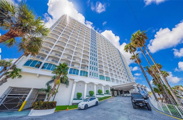 5401 Collins Ave Unit 419, Miami Beach, FL 33140 - view of property featuring asphalt driveway