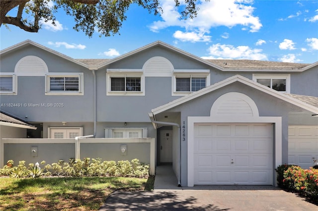 14263 SW 97th Ter, Miami, FL 33186 - view of property with stucco siding and a fenced front yard