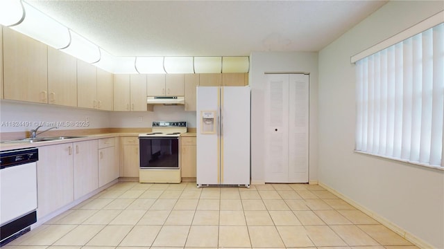 14263 SW 97th Ter, Miami, FL 33186 - kitchen with white appliances, under cabinet range hood, light countertops, and healthy amount of natural light