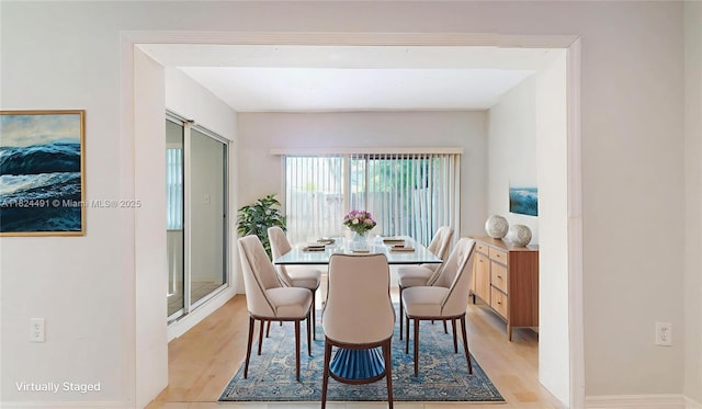 14263 SW 97th Ter, Miami, FL 33186 - dining area with light wood-style flooring