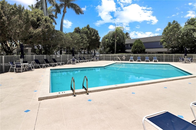 14263 SW 97th Ter, Miami, FL 33186 - community pool featuring a patio area