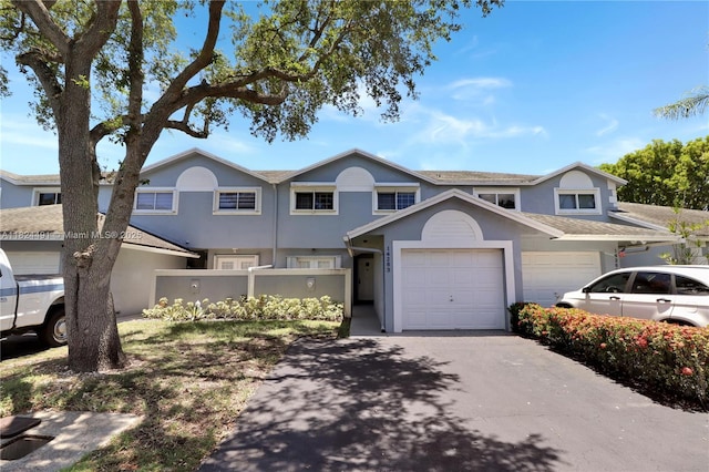 14263 SW 97th Ter, Miami, FL 33186 - townhome / multi-family property featuring asphalt driveway and stucco siding