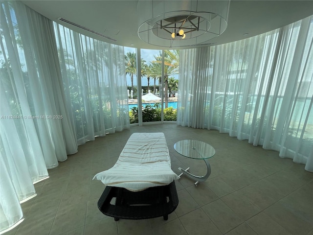 3301 NE 183rd St Unit 2203, Aventura, FL 33160 - sunroom featuring a chandelier