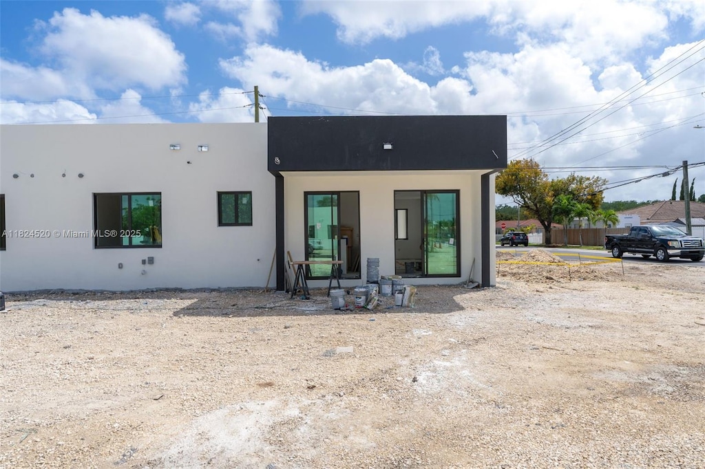 12383 SW 220th St, Miami, FL 33170 - rear view of house with stucco siding