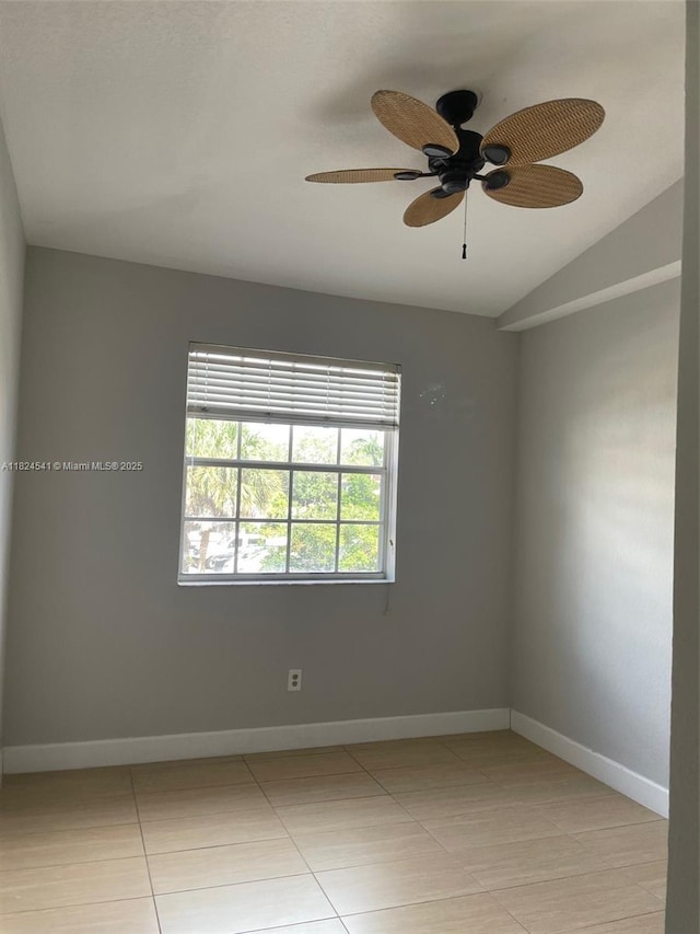 711 SW 148th Ave Unit 414, Sunrise, FL 33325 - spare room featuring light tile patterned flooring, vaulted ceiling, and ceiling fan