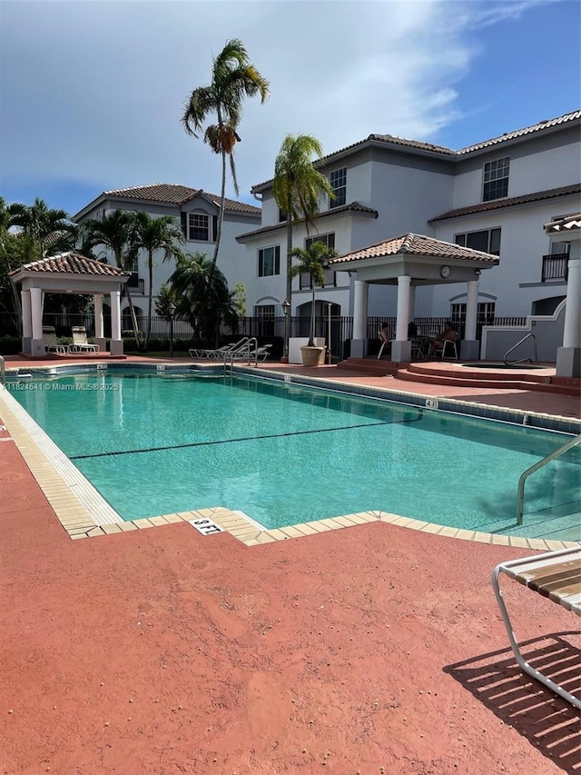 711 SW 148th Ave Unit 414, Sunrise, FL 33325 - community pool with a gazebo and a patio