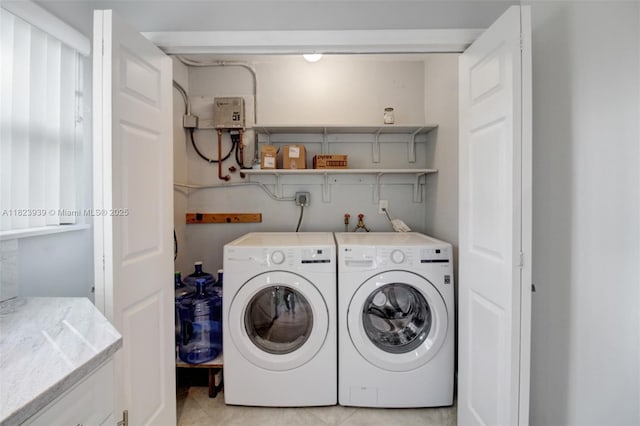 6255 SW 62nd Ct, South Miami, FL 33143 - laundry room featuring washer and dryer and light tile patterned floors