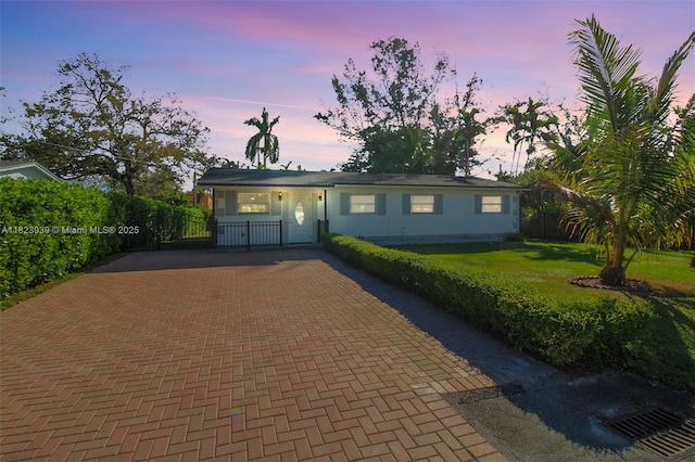 6255 SW 62nd Ct, South Miami, FL 33143 - ranch-style home featuring decorative driveway and a gate