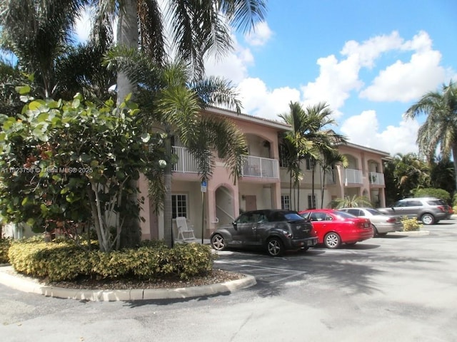4812 Washington St Unit 8, Hollywood, FL 33021 - view of building exterior with uncovered parking