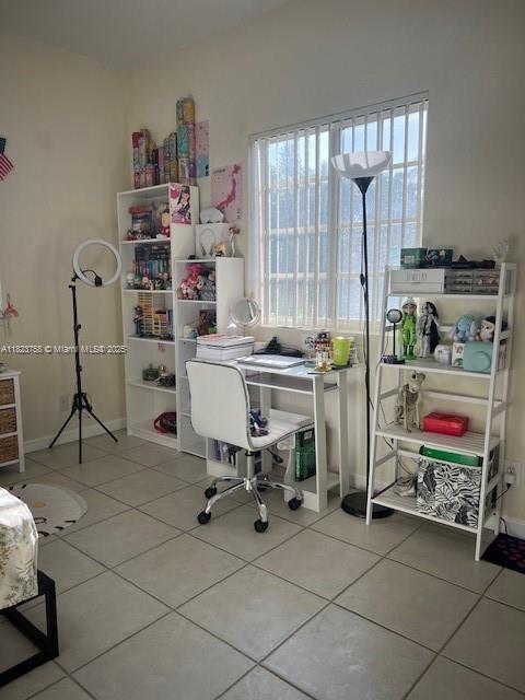 4812 Washington St Unit 8, Hollywood, FL 33021 - tiled home office with baseboards