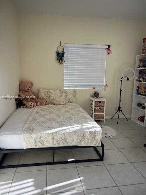 4812 Washington St Unit 8, Hollywood, FL 33021 - bedroom featuring tile patterned floors and baseboards