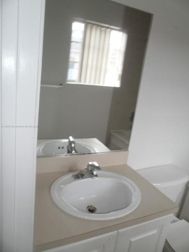 4812 Washington St Unit 8, Hollywood, FL 33021 - bathroom with vanity and toilet