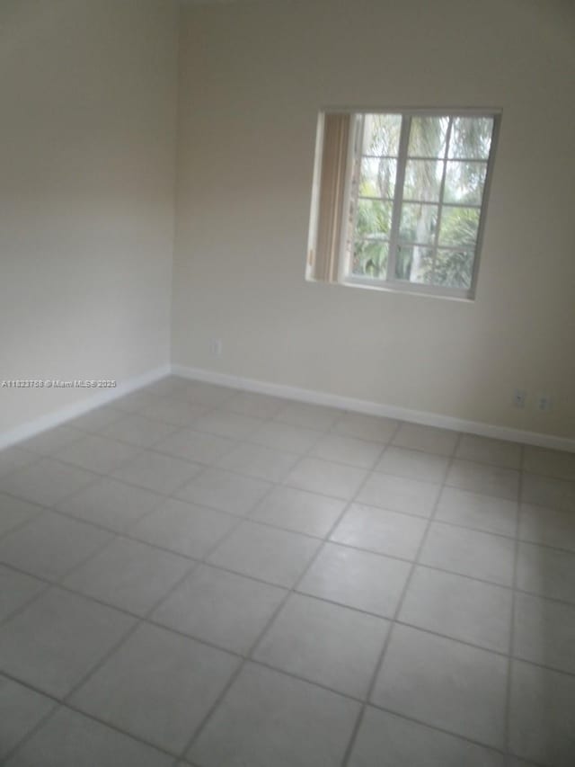 4812 Washington St Unit 8, Hollywood, FL 33021 - unfurnished room with light tile patterned floors