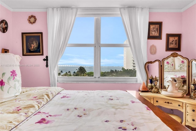 770 Claughton Island Dr Unit 806, Miami, FL 33131 - bedroom with ornamental molding and a water view