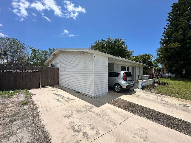 3180 NE 10th Ter, Pompano Beach, FL 33064 - view of property exterior with driveway
