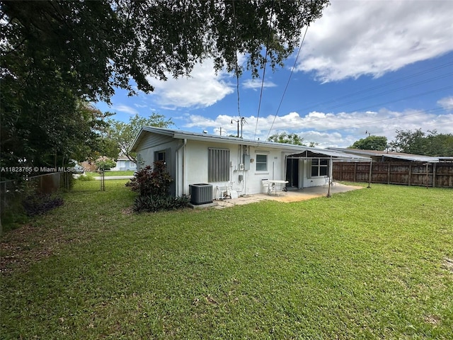 3180 NE 10th Ter, Pompano Beach, FL 33064 - rear view of house featuring a patio