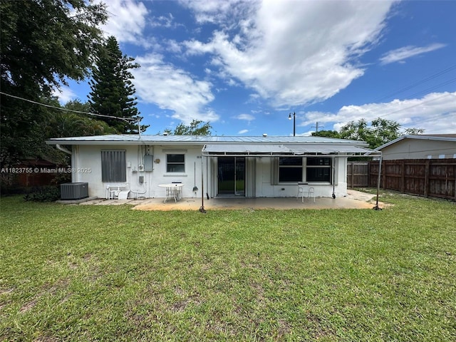 3180 NE 10th Ter, Pompano Beach, FL 33064 - back of house with a patio area