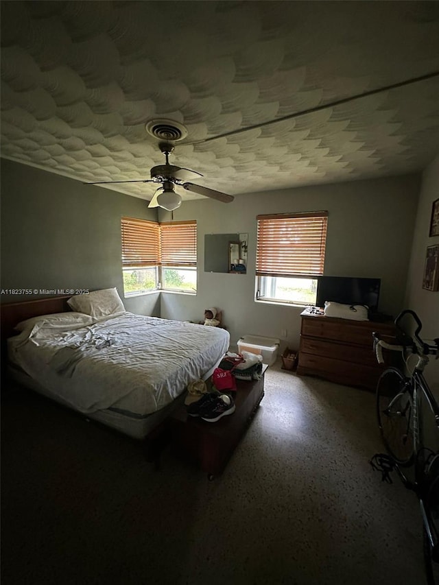 3180 NE 10th Ter, Pompano Beach, FL 33064 - bedroom with multiple windows and a ceiling fan