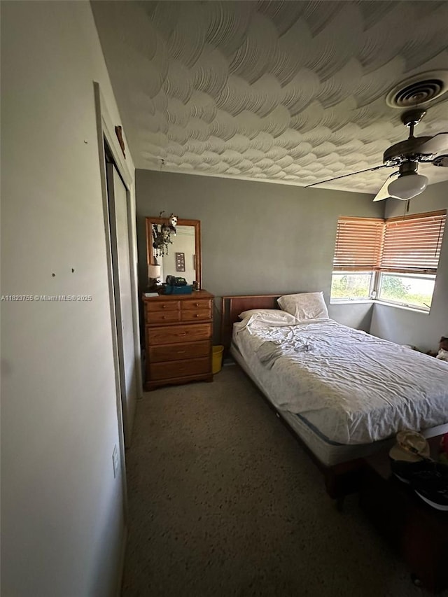 3180 NE 10th Ter, Pompano Beach, FL 33064 - bedroom featuring a closet and a ceiling fan