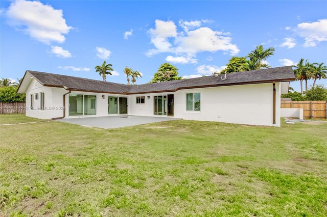 12511 SW 115th Ave, Miami, FL 33176 - rear view of property with stucco siding and a patio area