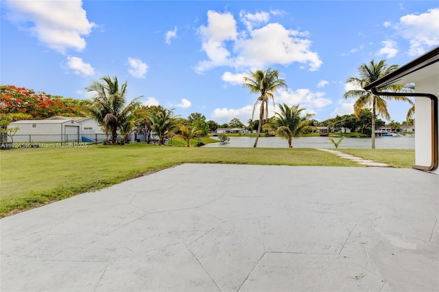 12511 SW 115th Ave, Miami, FL 33176 - view of patio / terrace with a water view