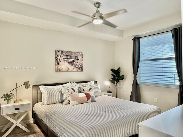 4751 Clock Tower Dr Unit 307, Kissimmee, FL 34746 - carpeted bedroom with baseboards and ceiling fan