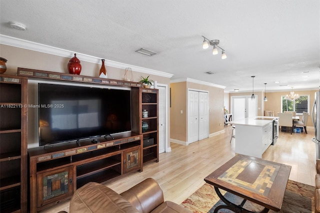 2309 SW 62nd Ct, Miami, FL 33155 - living room with ornamental molding and light wood finished floors