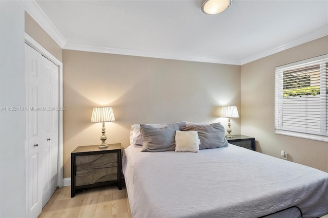 2309 SW 62nd Ct, Miami, FL 33155 - bedroom with wood finished floors, crown molding, and a closet