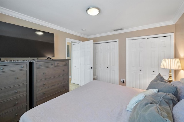 2309 SW 62nd Ct, Miami, FL 33155 - bedroom featuring two closets and crown molding