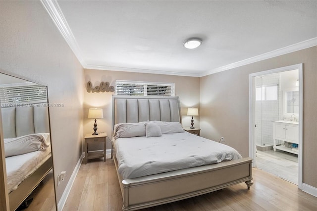 2309 SW 62nd Ct, Miami, FL 33155 - bedroom with crown molding, light wood-style flooring, and ensuite bathroom