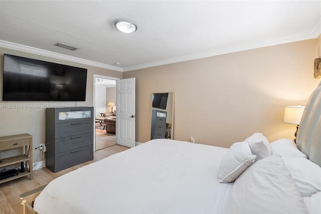 2309 SW 62nd Ct, Miami, FL 33155 - bedroom featuring crown molding and light wood finished floors