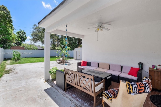 2309 SW 62nd Ct, Miami, FL 33155 - fenced backyard with outdoor lounge area, a storage unit, a patio, and a ceiling fan