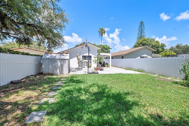 2309 SW 62nd Ct, Miami, FL 33155 - fenced backyard with a patio area and a storage shed