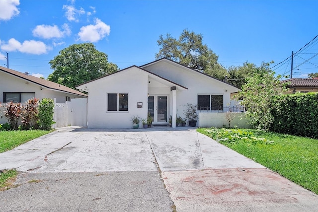 2309 SW 62nd Ct, Miami, FL 33155 - bungalow-style home featuring stucco siding and french doors