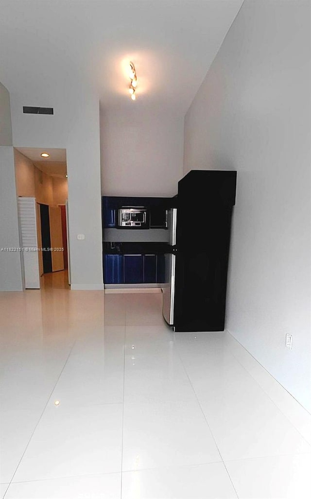 253 NE 2nd St Unit 222, Miami, FL 33132 - empty room with tile patterned floors