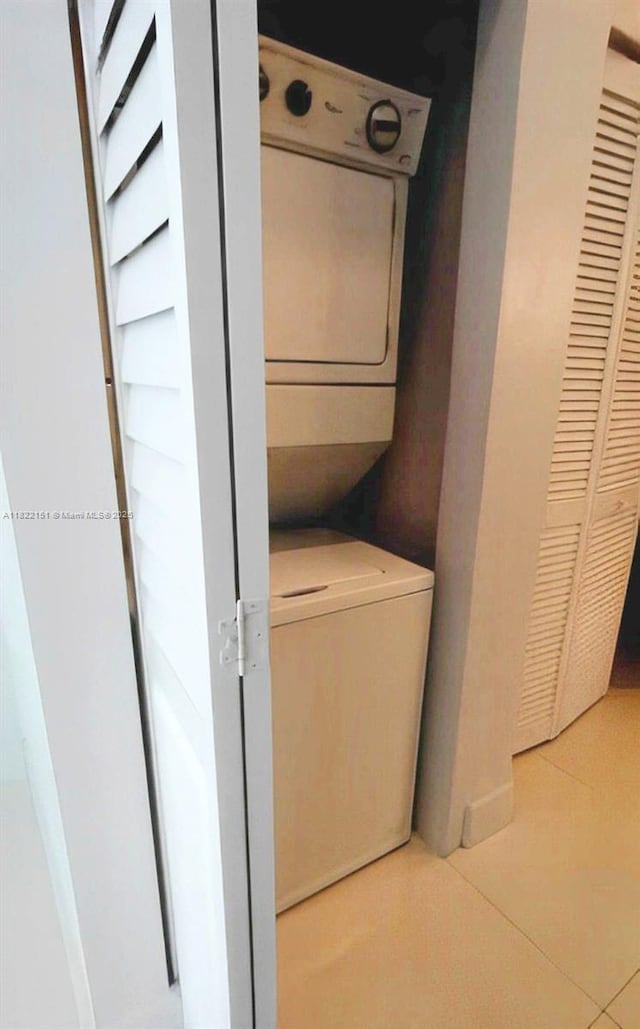 253 NE 2nd St Unit 222, Miami, FL 33132 - washroom featuring stacked washing machine and dryer