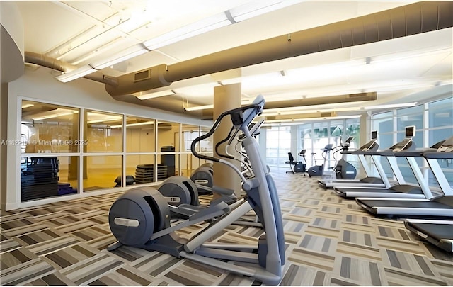 253 NE 2nd St Unit 222, Miami, FL 33132 - exercise room with carpet flooring