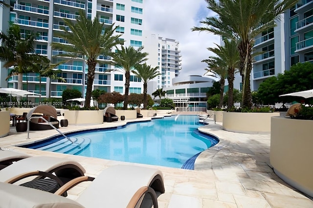 253 NE 2nd St Unit 222, Miami, FL 33132 - community pool featuring a patio
