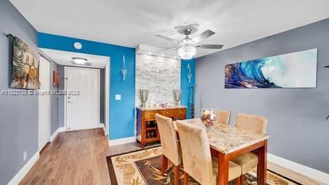 200 Leslie Dr Unit 407, Hallandale Beach, FL 33009 - dining area featuring wood finished floors and ceiling fan