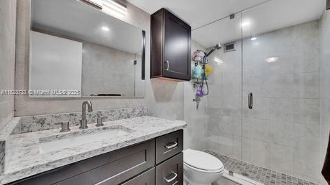200 Leslie Dr Unit 407, Hallandale Beach, FL 33009 - bathroom featuring vanity and a shower stall