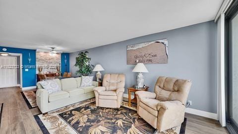 200 Leslie Dr Unit 407, Hallandale Beach, FL 33009 - living room featuring wood finished floors and baseboards