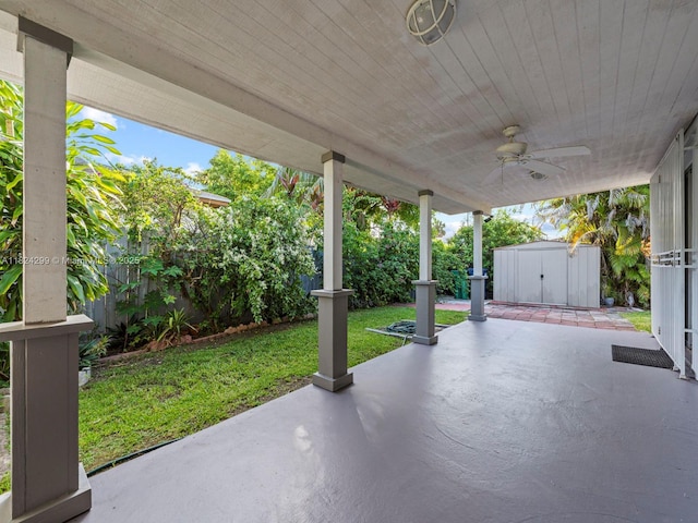 15314 SW 102nd Ct, Miami, FL 33157 - fenced backyard with a shed, a patio, and ceiling fan