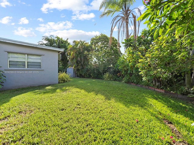15314 SW 102nd Ct, Miami, FL 33157 - view of green lawn with a storage unit