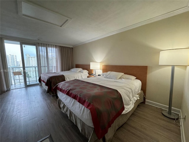 19201 Collins Ave Unit 1137, Sunny Isles Beach, FL 33160 - bedroom with attic access, access to exterior, wood finished floors, and ornamental molding